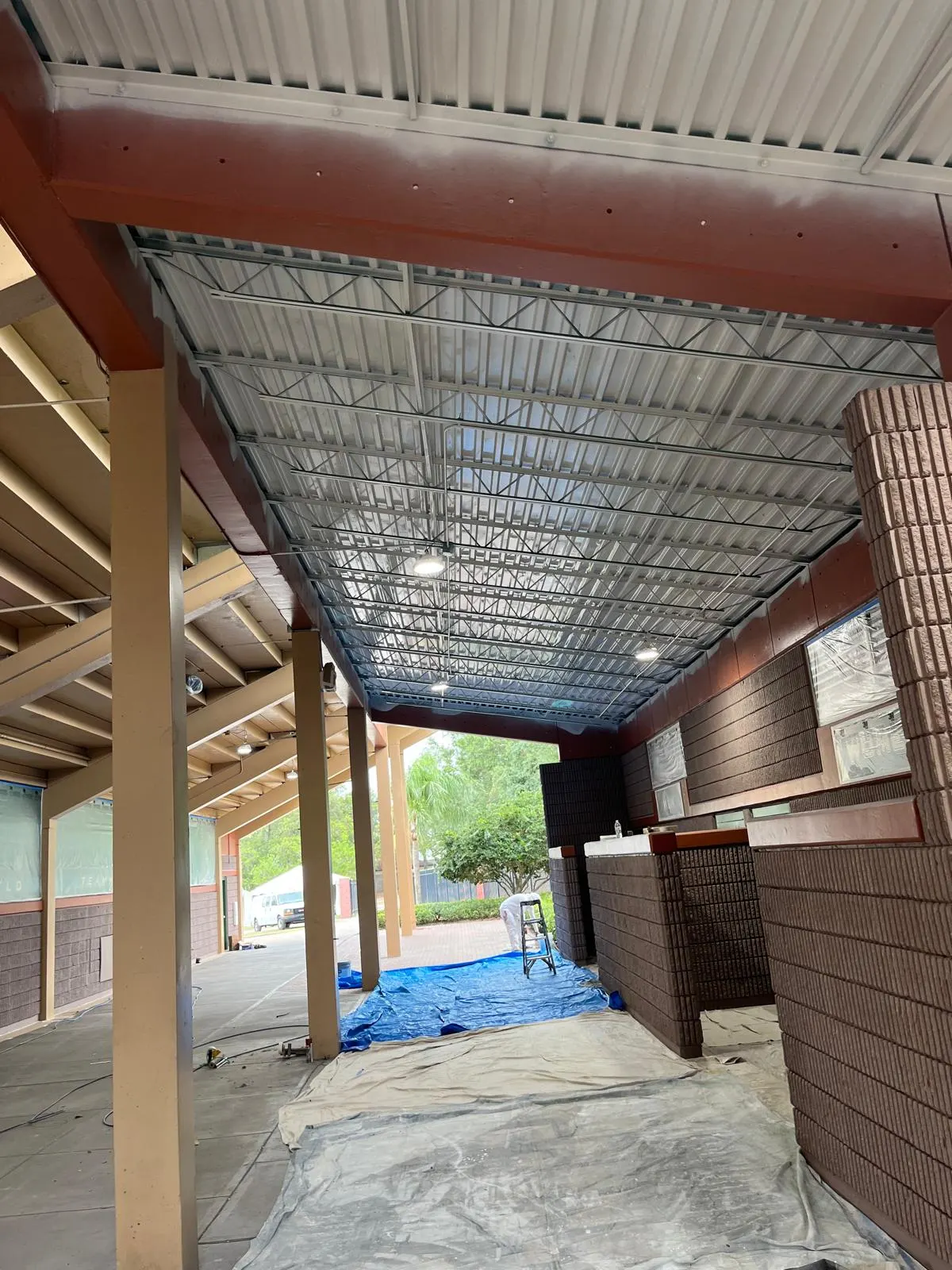 Structural steel ceiling before painting on a covered walkway