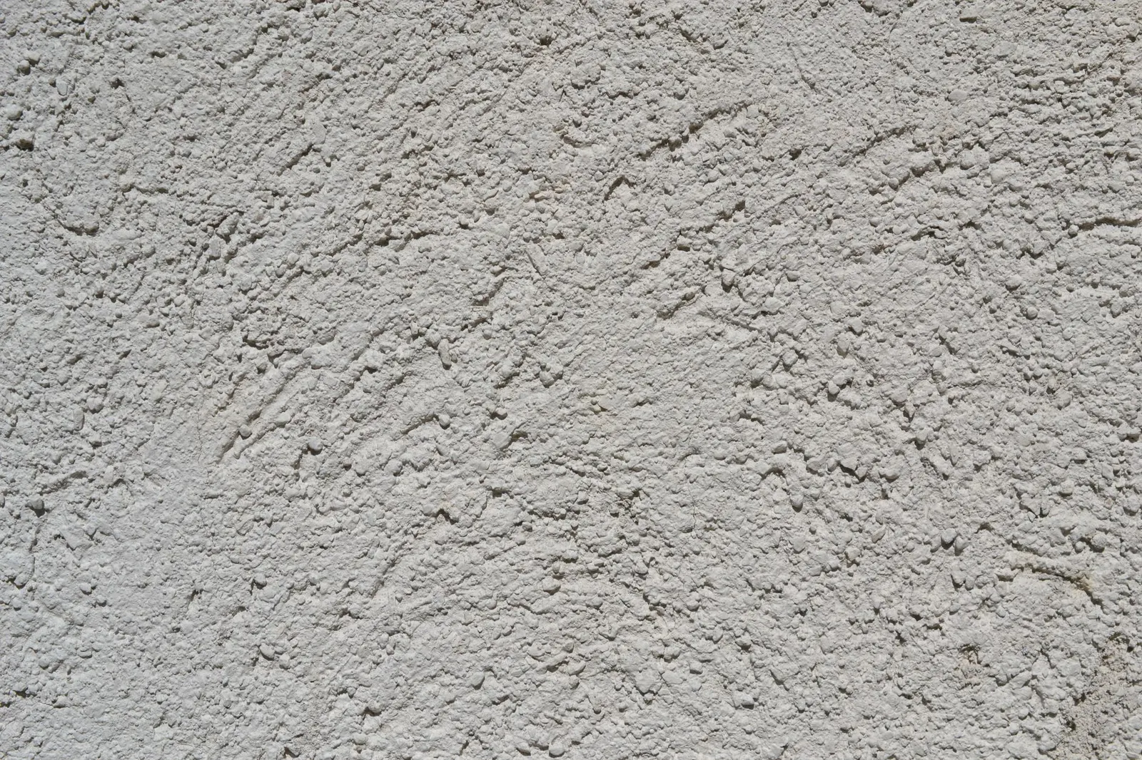 Close-up of a textured stucco wall finish